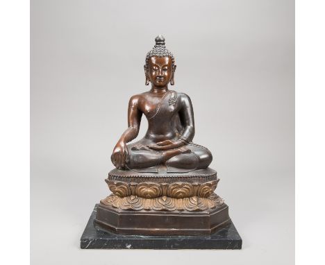 Chinese Buddha, in sitting position on Lotus base, bronze cast with light brown patina, on black marble base, 43 cm high