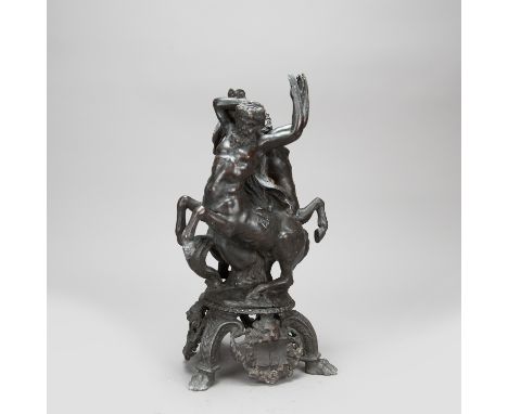 Centre piece in Renaissance manner, with male and female centaurs, open worked, base with lions and three feet, former top pa