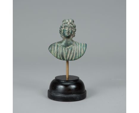 Male Bronze Bust, in ancient manner, full cast with fine hand finish and original dark patina with verdi gris, on later eboni