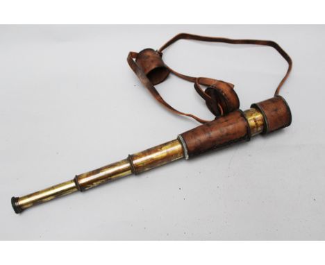 Travel Telescope, polished brass, glass lenses in leather cover 20th century, 46 cm
