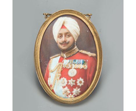 Anglo-Indian School, portrait of an aristocratic Indian officer in uniform in front of brown background, oval miniature, wate