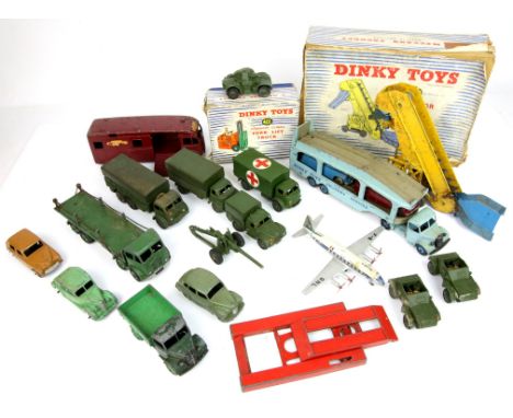 Two Dinky Toys model vehicles comprising, 401 14c Fork Lift Truck, 564 Elevator Loader, and loose Dinky military and other ve