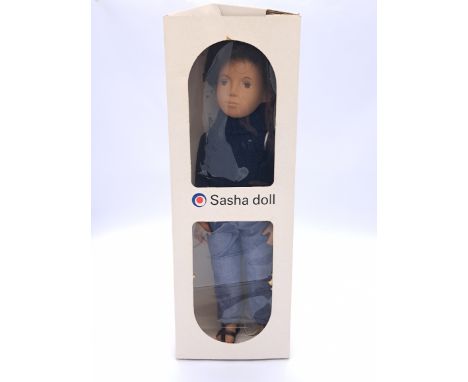 Trendon Gregor brunette doll, dark denims, # 433-750, wearing dark blue jumper, light blue jeans, brown sandals, some discolo