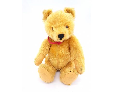 Steiff Original vintage teddy bear, 1950s, golden mohair, button and remains of yellow cloth tag, brown and black glass eyes,