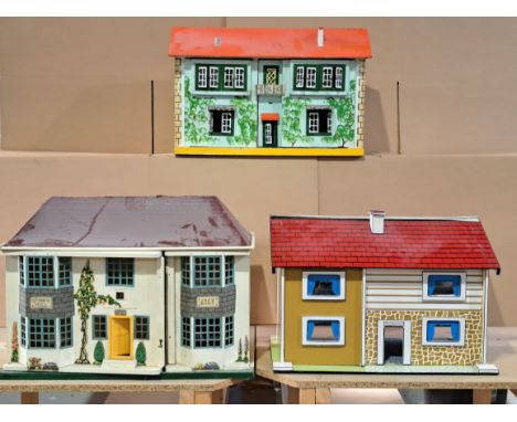 Triang and other doll's houses x four, plus a Triang Minic garage: (1) Spinny Hill house, tinplate front opens in two places,