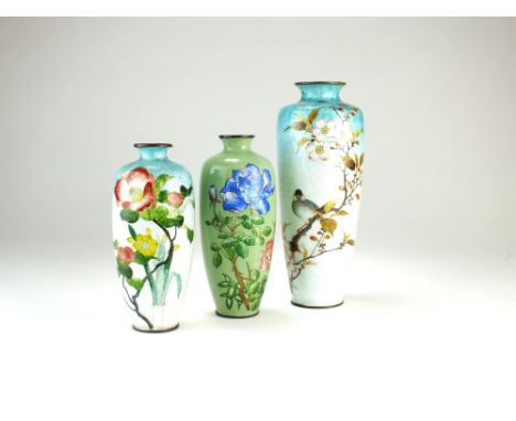Three Japanese ginbari cloisonne vases, Taisho era, the first of ovoid form and worked with a pigeon in flowering prunus bran
