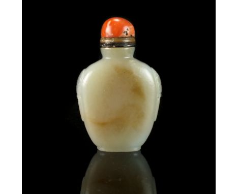 A Chinese nephrite jade snuff bottle, 19th century, the near white stone with russet inclusions well hollowed and of compress