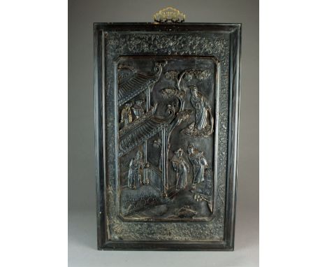 A pair of Chinese parcel gilt carved hard wood panels, 19th/20th Century, of rectangular form and worked in relief with scene