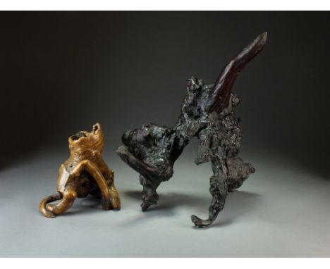 Two Chinese natural wood root scholar's rocks, late Qing Dynasty, the first probably tea root of pale brown hue and hollow wr