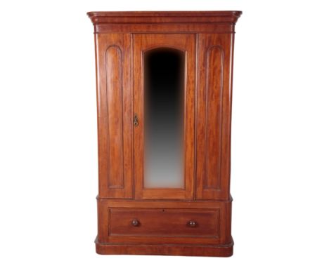 THOMAS HARDY INTEREST: AN EDWARDIAN MAHOGANY WARDROBE FROM MAX GATE early 20th century, the moulded cornice over a mirrored d