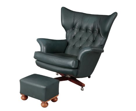 A G PLAN MODEL 6250 'BLOFELD' WING ARMCHAIR, DESIGNED BY PAUL CONTI with later blue leather covers, 98cm high x 93cm wide, to