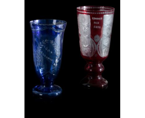 TWO CUT GLASS PRESENTATION TROPHIES including a ruby example engraved 'ROMANIA ACR FRAK, 37cm high, and another engraved 'FRA