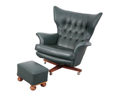 A G PLAN MODEL 6250 'BLOFELD' WING ARMCHAIR, DESIGNED BY PAUL CONTI with later blue leather covers, 100cm high x 93cm wide, t