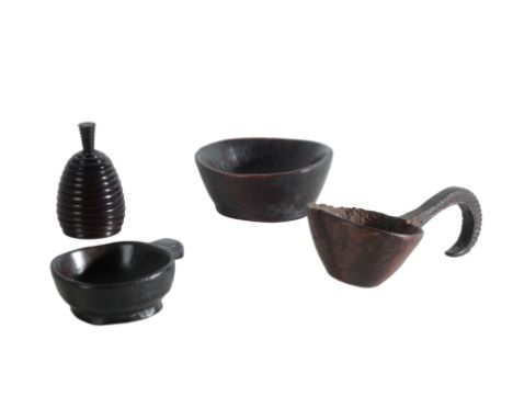 A SMALL COLLECTION OF TREEN including a carved wood ladle, 23cm long, two wooden bowls, the larger 17cm wide, the smaller 14.
