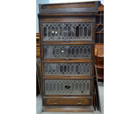 Four oak and lead glazed sectional Globe-Wernicke style bookcase, together with extras