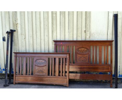 Edwardian mahogany and inlaid bed ends