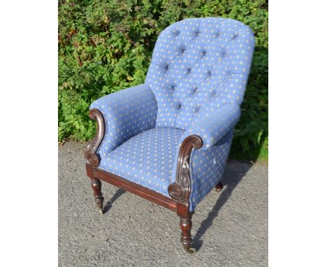 Mahogany and blue upholstered button back armchair on carved supports