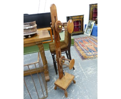 TWO MADDOX PINE WOOL WINDERS CONVERTED INTO LAMPS, THE LAMP SOCKETS WITHIN PAIRS OF SPOOLS ADJUSTABLE ON EACH BACK PLATE STAN