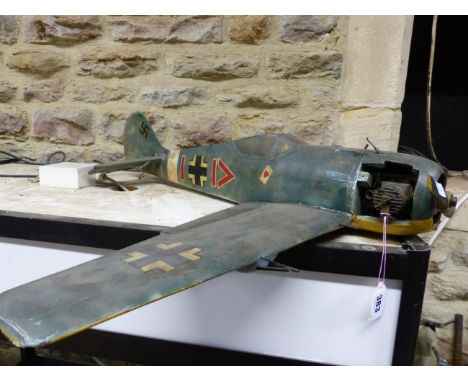 A GERMAN WORLD WAR II MODEL FIGHTER PLANE WITH FUEL DRIVEN ENGINE, THE WINGS.   W 85cms.