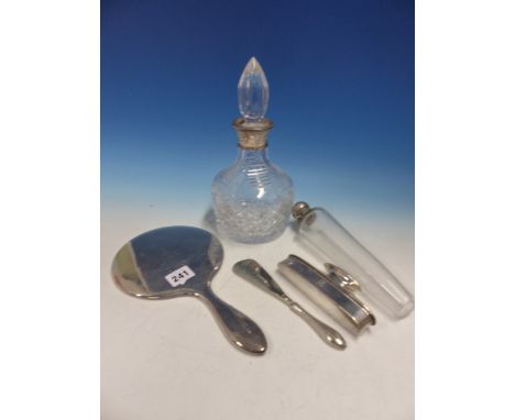 A HALLMARKED SILVER DRESSING MIRROR, SILVER NAIL BUFFER, SHOE HORN, A HUNTING FLASK, AND A SILVER MOUNTED CUT GLASS DECANTER.