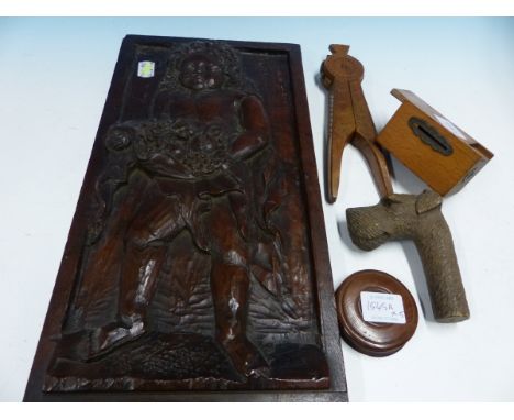 A COLLECTION OF FIVE PIECES OF TREEN, TO INCLUDE A RELIEF CARVED PANEL WITH A FIGURE CARRYING FRUIT.   38 x 19.5cms. A CHIP C