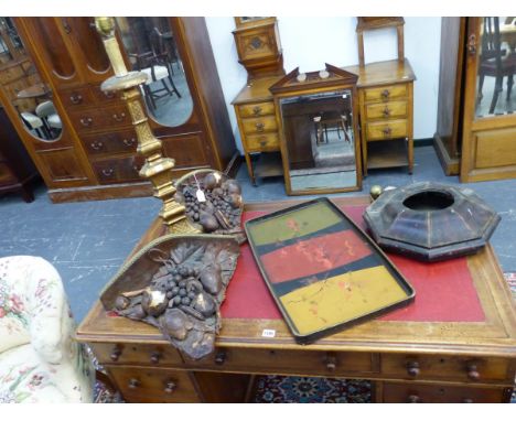 TWO ANTIQUE WALL BRACKETS DECORATED WITH LEATHER FRUIT, A TOLEWARE WALL CLOCK CASE, A GILTWOOD TABLE LAMP AND A LACQUER TRAY.