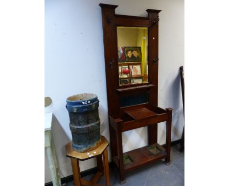 AN ARTS AND CRAFTS OAK MIRROR BACKED HALL STAND, THE FOUR COAT HOOKS WITHIN CHEQUER BAND INLAY.   W 77 x D 32 x H 203cms.