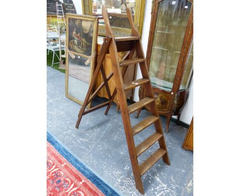 A TEAK LIBRARY STEP LADDER WITH HANDLES ABOVE THE SEVEN TREADS.   H 169cms.