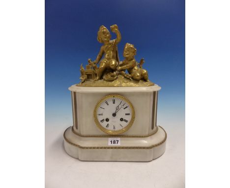 A 19th.C.ORMOLU AND WHITE MARBLE CLOCK SURMOUNTED BY TWO CHILDREN, THE PENDULUM MOVEMENT STRIKING ON A BELL INSCRIBED HATTON 