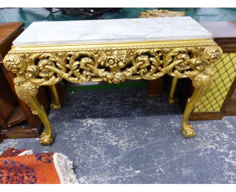 A 18th.C. STYLE GILTWOOD CONSOLE TABLE WITH INSET MARBLE TOP AND CLAW AND BALL FEET.   W.137 x D.54 x H.94cms.