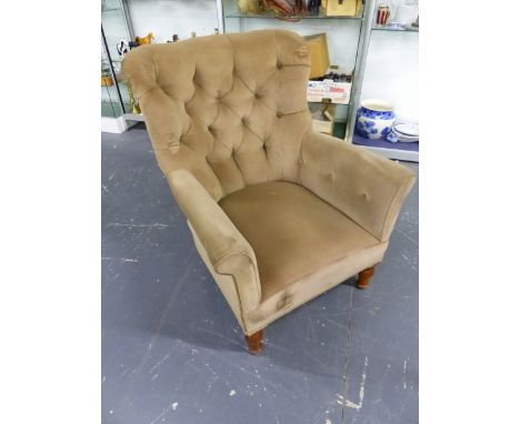 A LATE VICTORIAN BUTTON BACK ARMCHAIR IN MUSHROOM UPHOLSTERY, STAMPED SADGROVE AND CO.