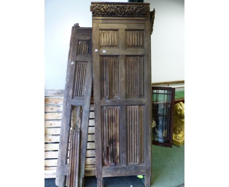 TWO EARLY CARVED OAK ARCHITECTURAL LINEN FOLD PANEL SECTIONS WITH SOME MOULDINGS.