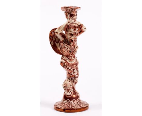 A SINGLE ITALIAN CANTAGALLI CANDLE STICK with lustre painted decoration of a mythical creature, with usual painted mark to th