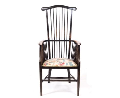 AN EARLY TO MID 20TH CENTURY COMB BACK WINDSOR ARMCHAIR  57cm wide x 121cm high 