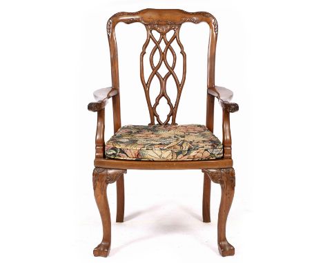 A CHIPPENDALE STYLE ANGLO ORIENTAL ROSEWOOD OPEN ARMCHAIR with carved cresting rail, interlaced pierced splat back, inset pan