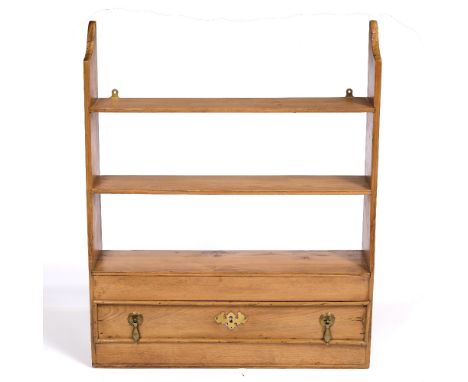 A PINE HANGING WALL SHELF  with single drawer, 57cm wide x 15cm deep x 69.5cm high