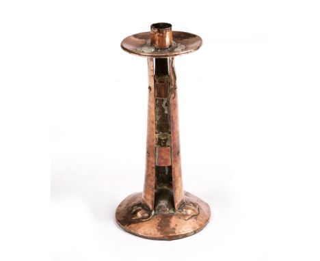 AN ARTS & CRAFTS COPPER CANDLESTICK of riveted construction stamped beneath with makers mark of Arthur John Seward 12.5cm wid