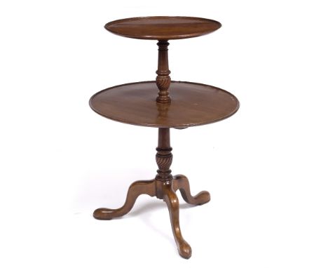 A GEORGE III MAHOGANY CIRCULAR TWO TIER DUMB WAITER with turned and carved central support and tripod base, 59cm diameter x 8