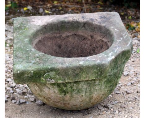 A CARVED SANDSTONE PLANTER OR TROUGH with square top (corner lacking) and bold centre 54cm wide x 42cm high 