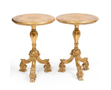 A PAIR OF GILT CIRCULAR OCCASIONAL TABLES in the 18th century style with acanthus leaf moulded supports and tripod base, 47cm