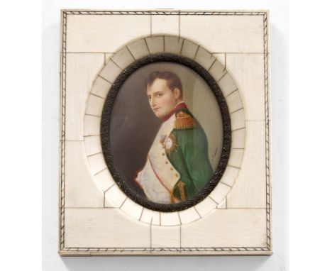 A PORTRAIT MINIATURE OF NAPOLEON  in an ivorine frame, the oval portrait indistinctly signed, the frame 11.8cm x 13.9cm