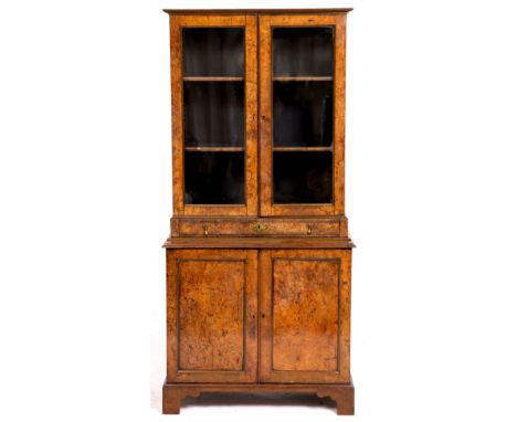 A VICTORIAN BURR WALNUT SECRETAIRE CABINET with two glazed panels above a compartmented desk drawer, fielded panel doors conc