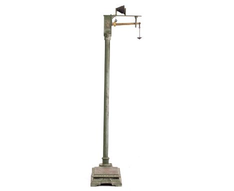 A SET OF LATE 18TH / EARLY 19TH CENTURY GREEN PAINTED CAST IRON FLOOR STANDING WEIGHING SCALES by W & T Avery with brass bala