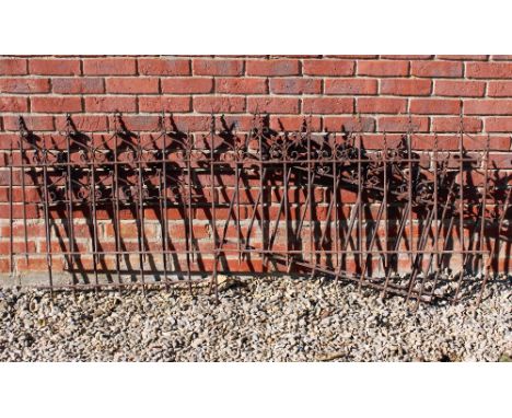 A SECTION OF DECORATIVE WROUGHT IRON RAILING with twisting finials approximately 45cm high (a quantity)