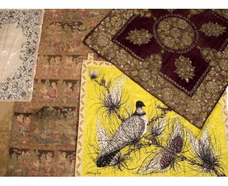 A COLLECTION OF MIDDLE EASTERN TEXTILES to include a Trapunto gold and silver threadwork panel on purple velvet, a hand embro