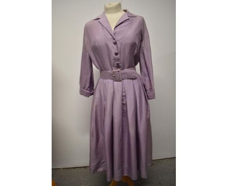 An American 1950s pure silk lavender coloured day dress, having pleated skirt, tucks to rear of bodice with braided floral de