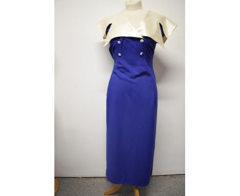 A Royal blue 1950s cotton day dress, having huge satin statement collar, side metal zip and faux button detail to front, larg