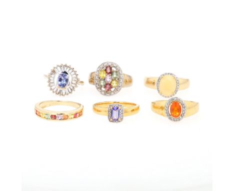 
6 Ringe Silber vergoldet mit Edelsteinen 

Material: 925 Silber, vergoldet
Edelsteine: Opal, farbbloser Zirkon, Tansanit, fa