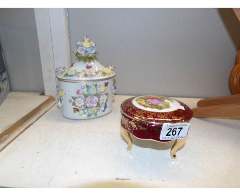 A Limoges trinket pot and a German flower encrusted lidded pot