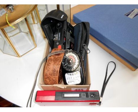 2 camera's and a light meter